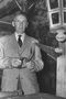 Ove Marcussen, museumschef fra 1933 til 1961, fotograferet på loftet på Anne Hvides Gård